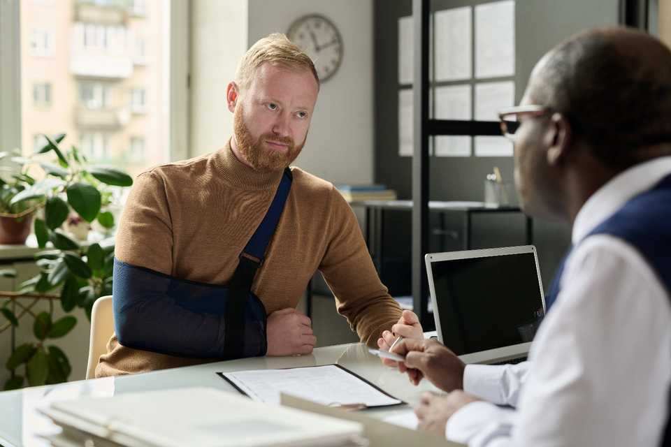 Disabled man filing an insurance claim